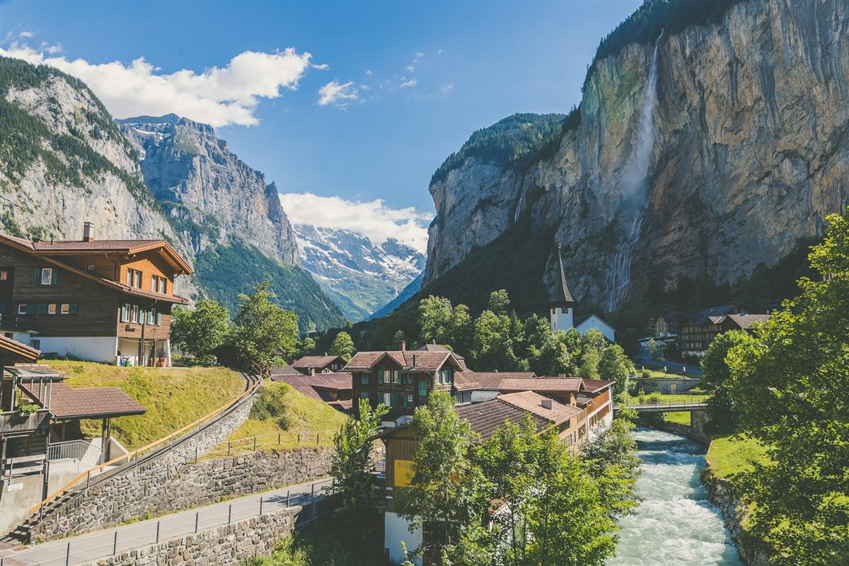 Swiss alpine village beneath towering cliffs in the Lauterbrunnen Valley